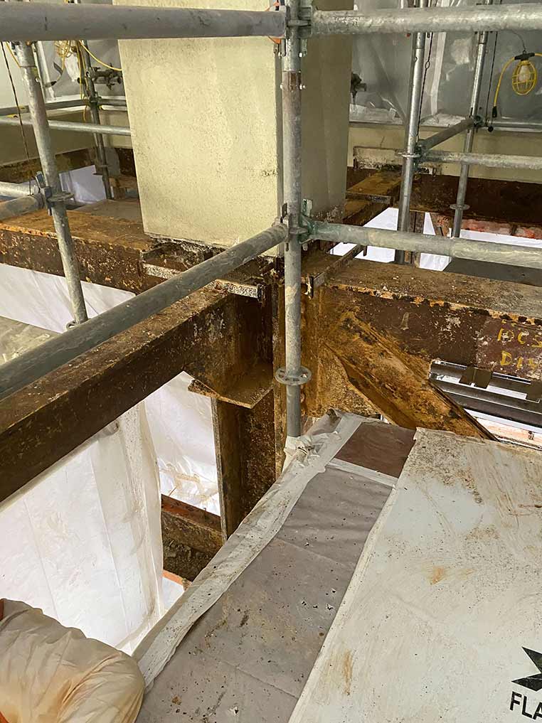 Asbestos abatement activity within the multi-floor medical facility project