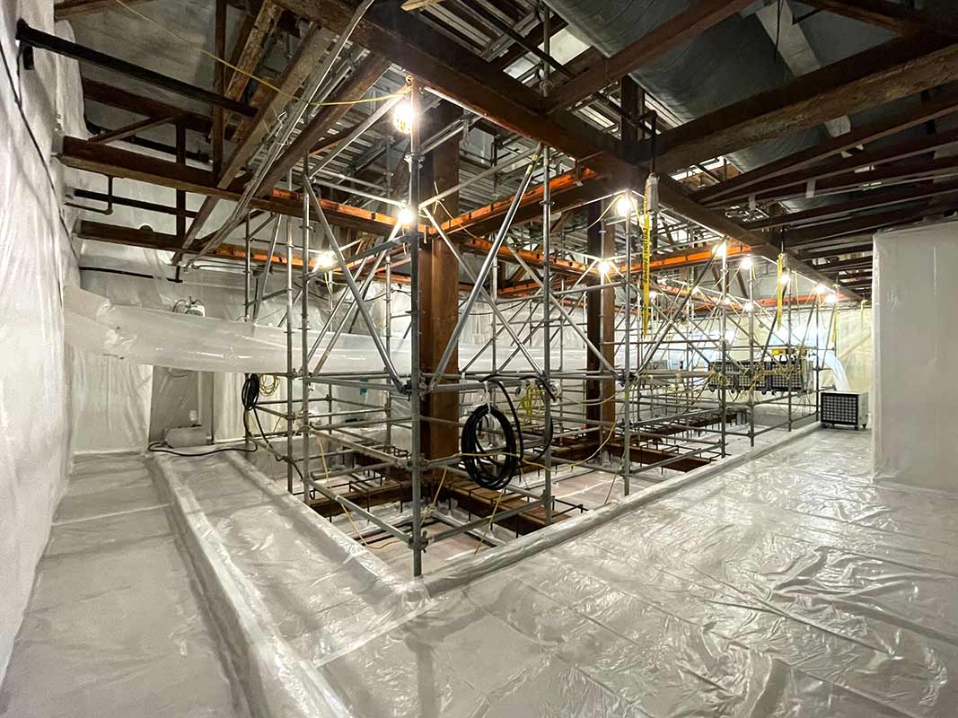 Wide view of the asbestos abatement work area inside the VA medical facility